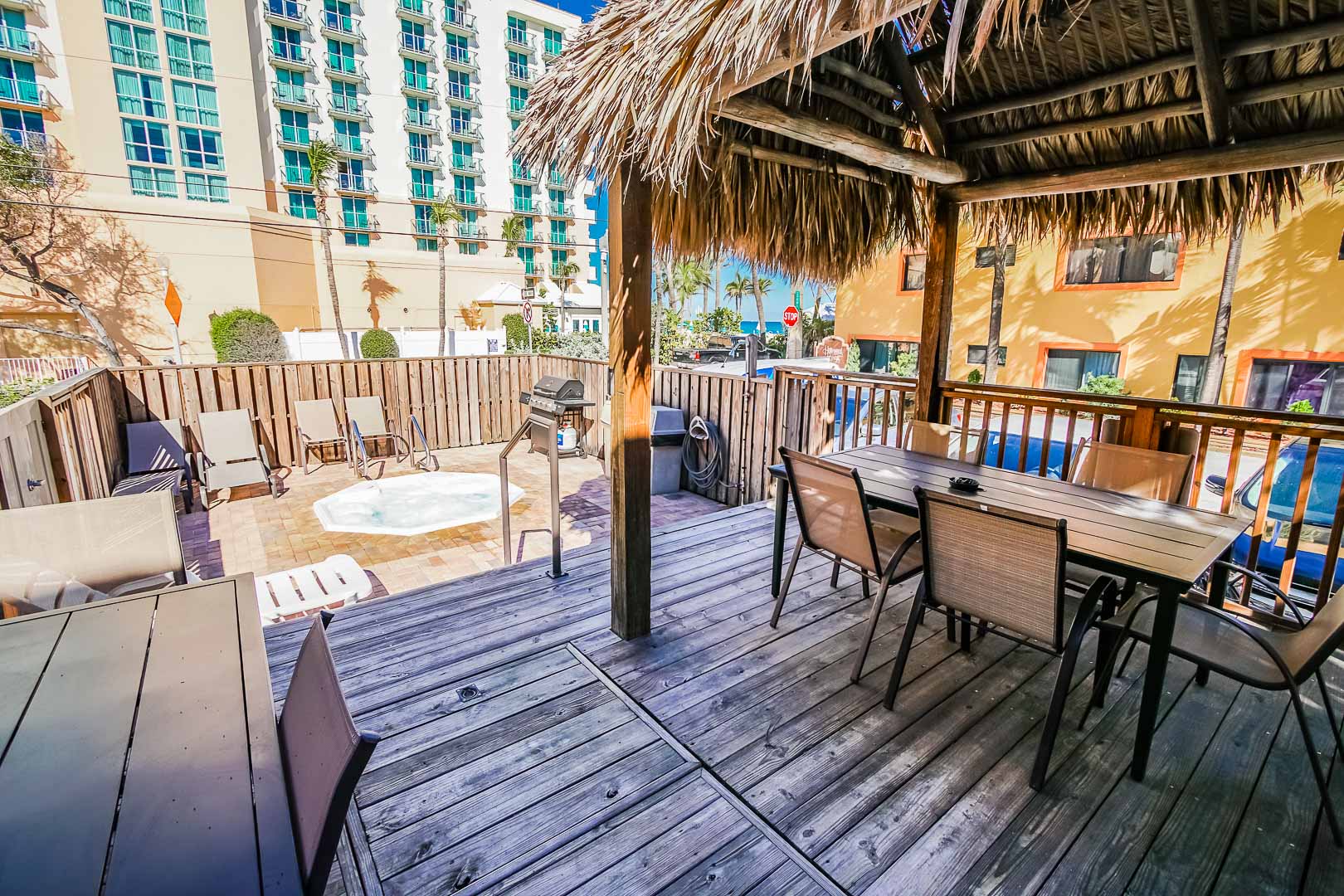 An airy patio deck next to the pool at VRI's Hollywood Sands Resort in Hollywood, Florida.